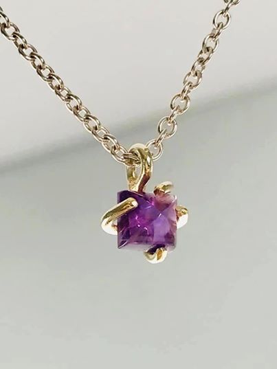Amethyst necklace with gold claws