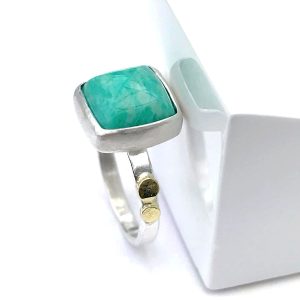 Green blue gemstone in square ring
