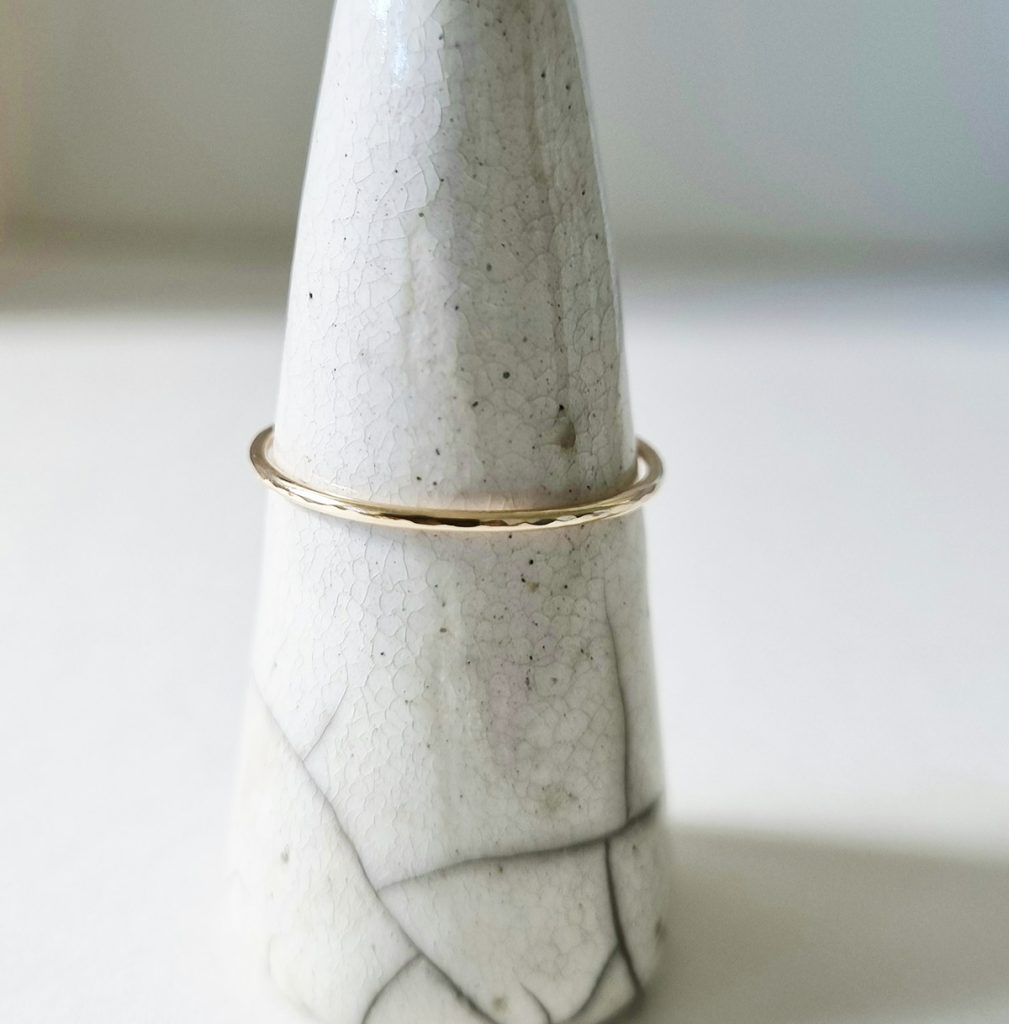 Gold ring on ring cone